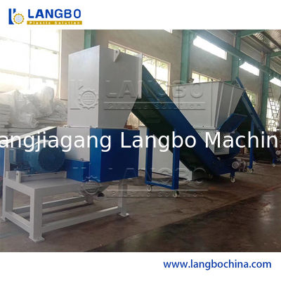 Déchets à double arbre Carton papier Pneus en caoutchouc Déchets métalliques Boîtes de bois en morceaux Barils tambours Pipe et déchiqueteuse en plastique pour machine de recyclage